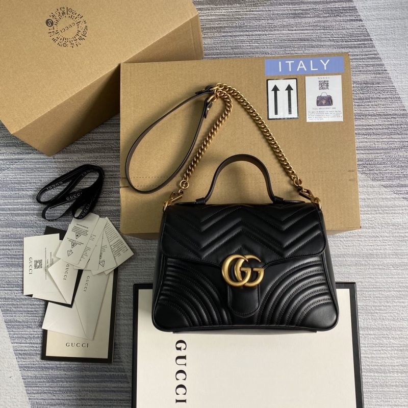 G*u*i top handle bags
